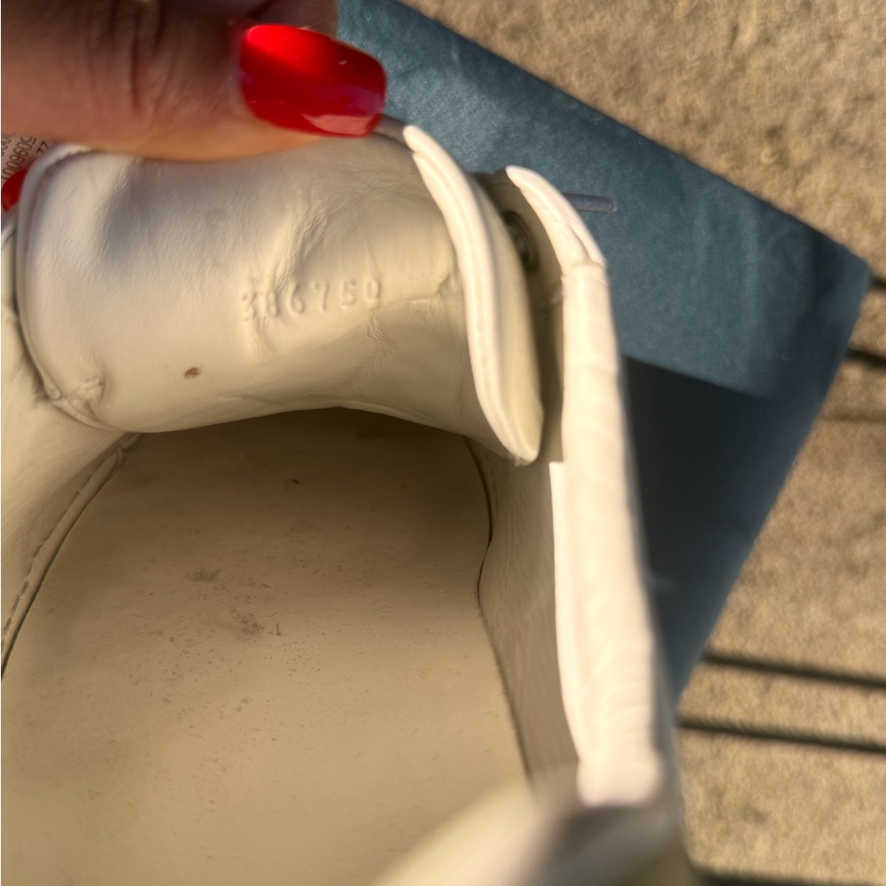 White authentic gucci sneakers.